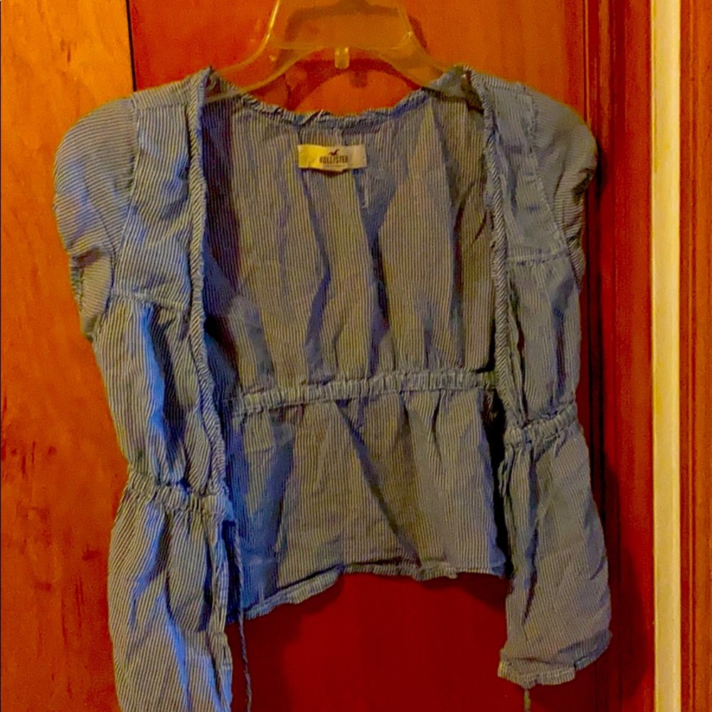 A blue and white hollister shirt